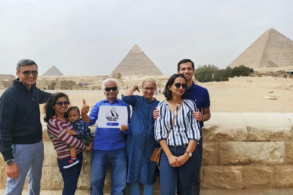 Happy travelers at the Great Pyramids
